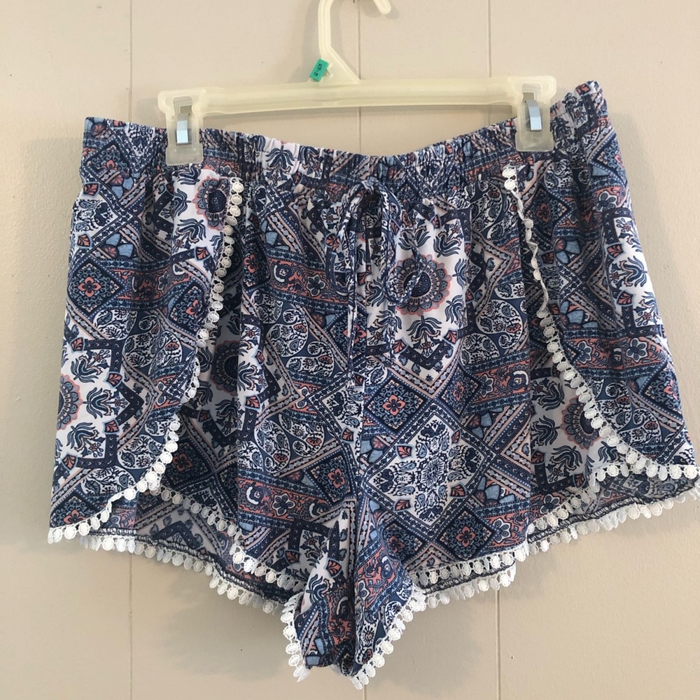 Paisley printed shorts with a lace-type hem. Size XL